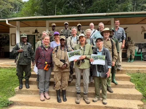 Guests show off their certificates after a successful gorilla trek