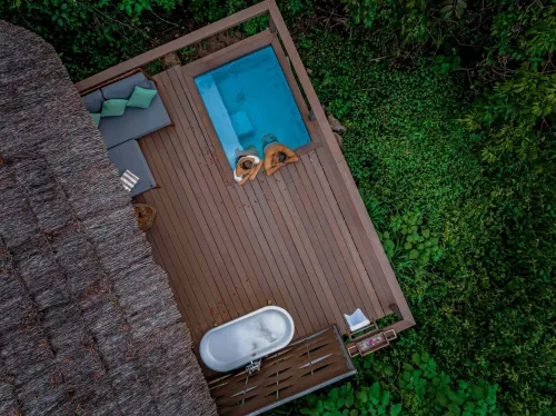 An aerial view of Tourists in a plunge pool at Wildwaters lodge