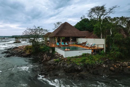 Tourists in a plunge pool at Wildwaters lodge